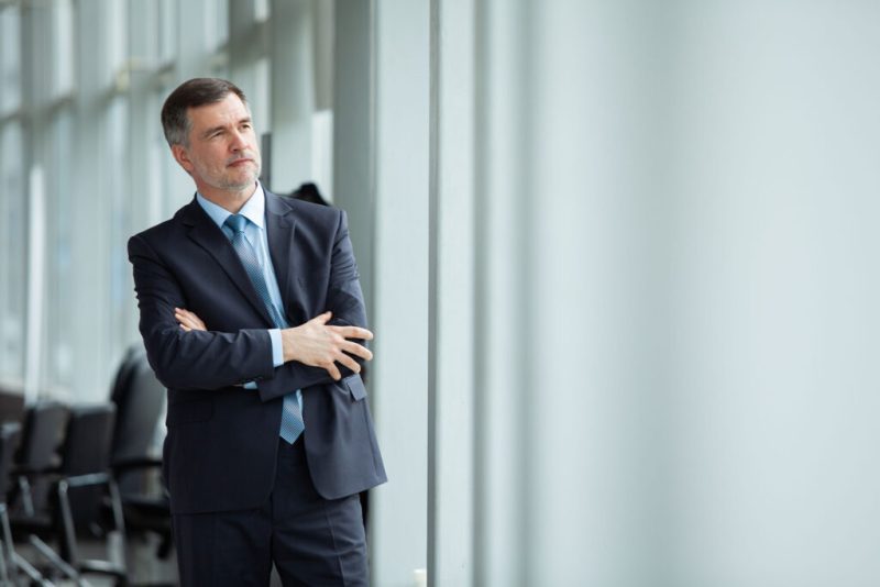A Man Thinking About Retirement Solutions