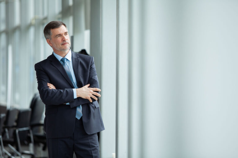 A Man Thinking About Retirement Solutions