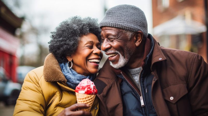 Holiday Funding Retirement Solutions - Retired Couple enjoying a holiday ice-cream.