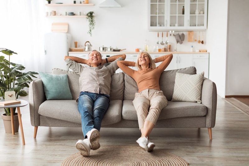 House Ready for Viewing Retired Couple Sat Relaxed Downsizing